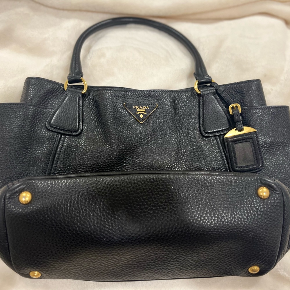 I’m selling a black prada handbag medium sized